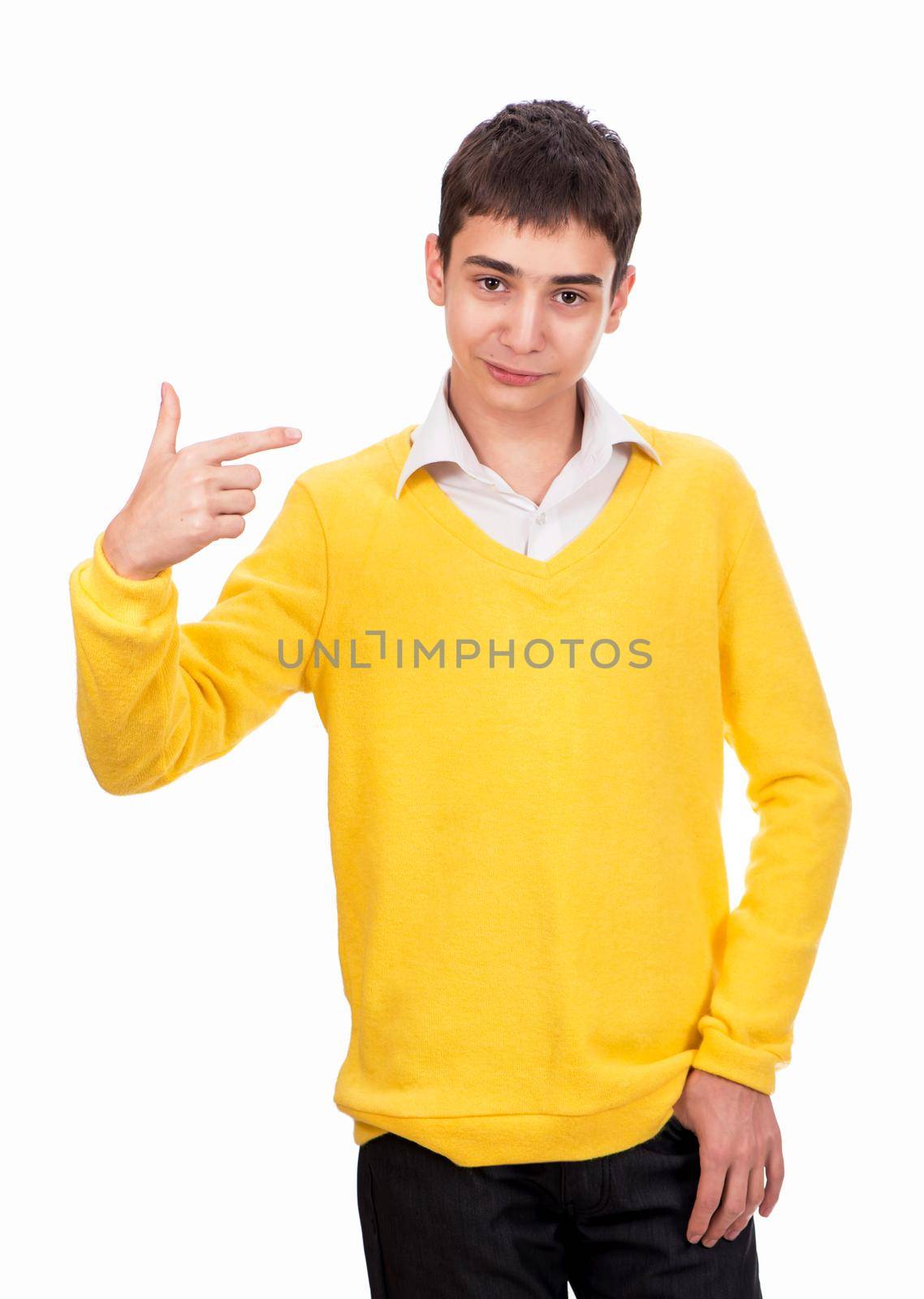 Pick me. schoolboy in yellow sweater points at himself with hand isolated on white background by aprilphoto