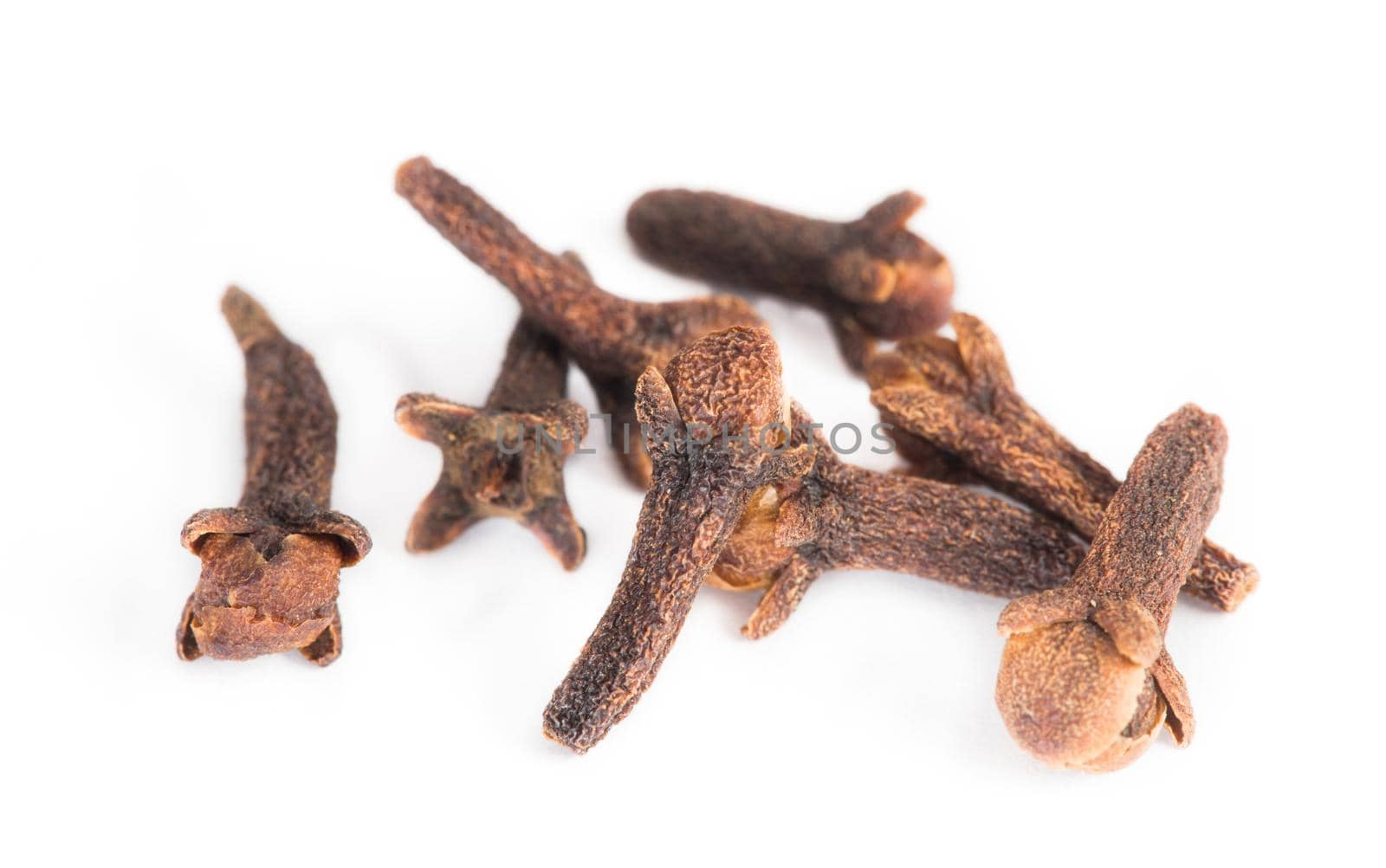 Closeup of cloves on white background