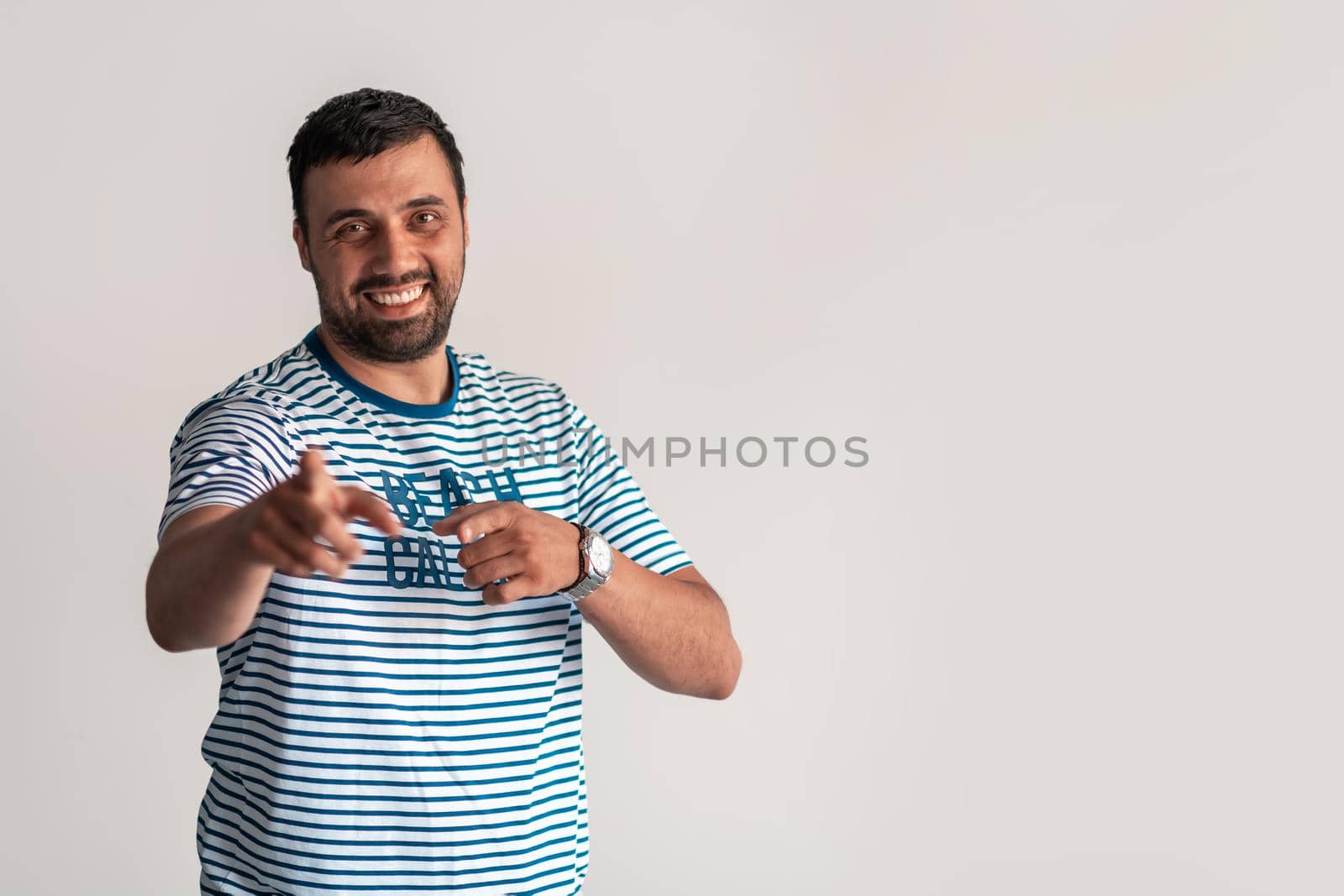 Formal business male portrait. A confident successful casual businessman or manager stands in front of a white background. by dotshock