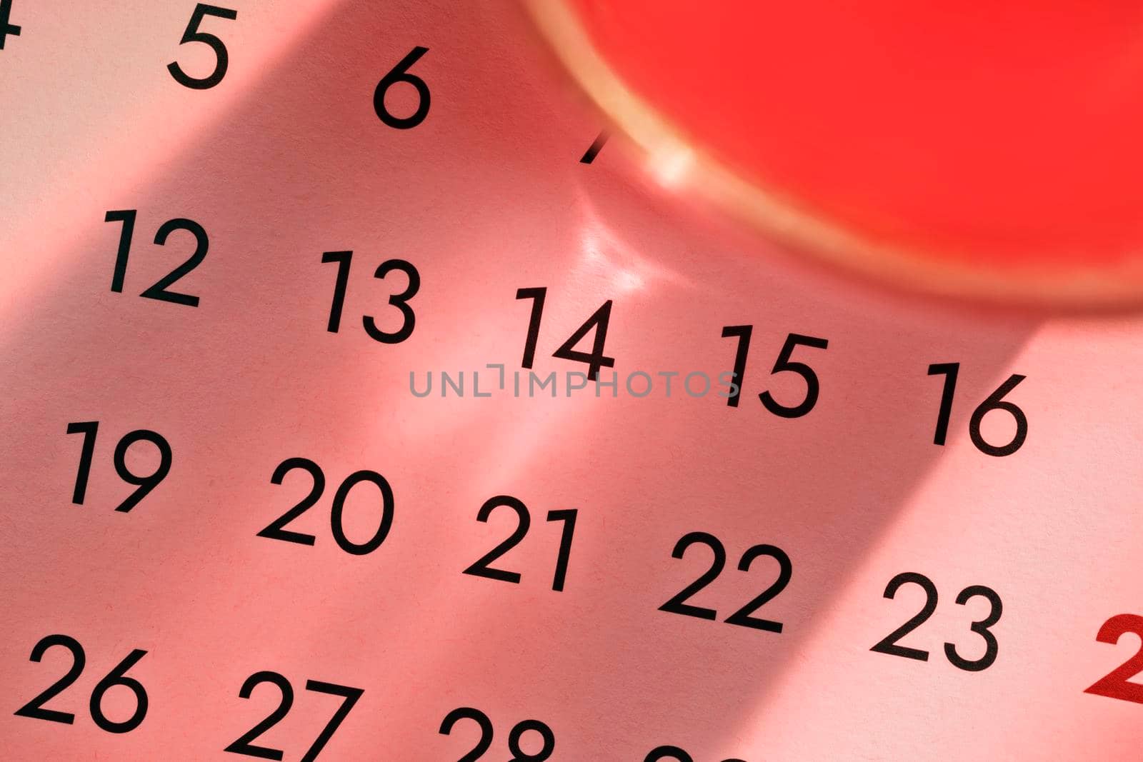 Calendar with red light shadows , spot light on number 14 , celebration event