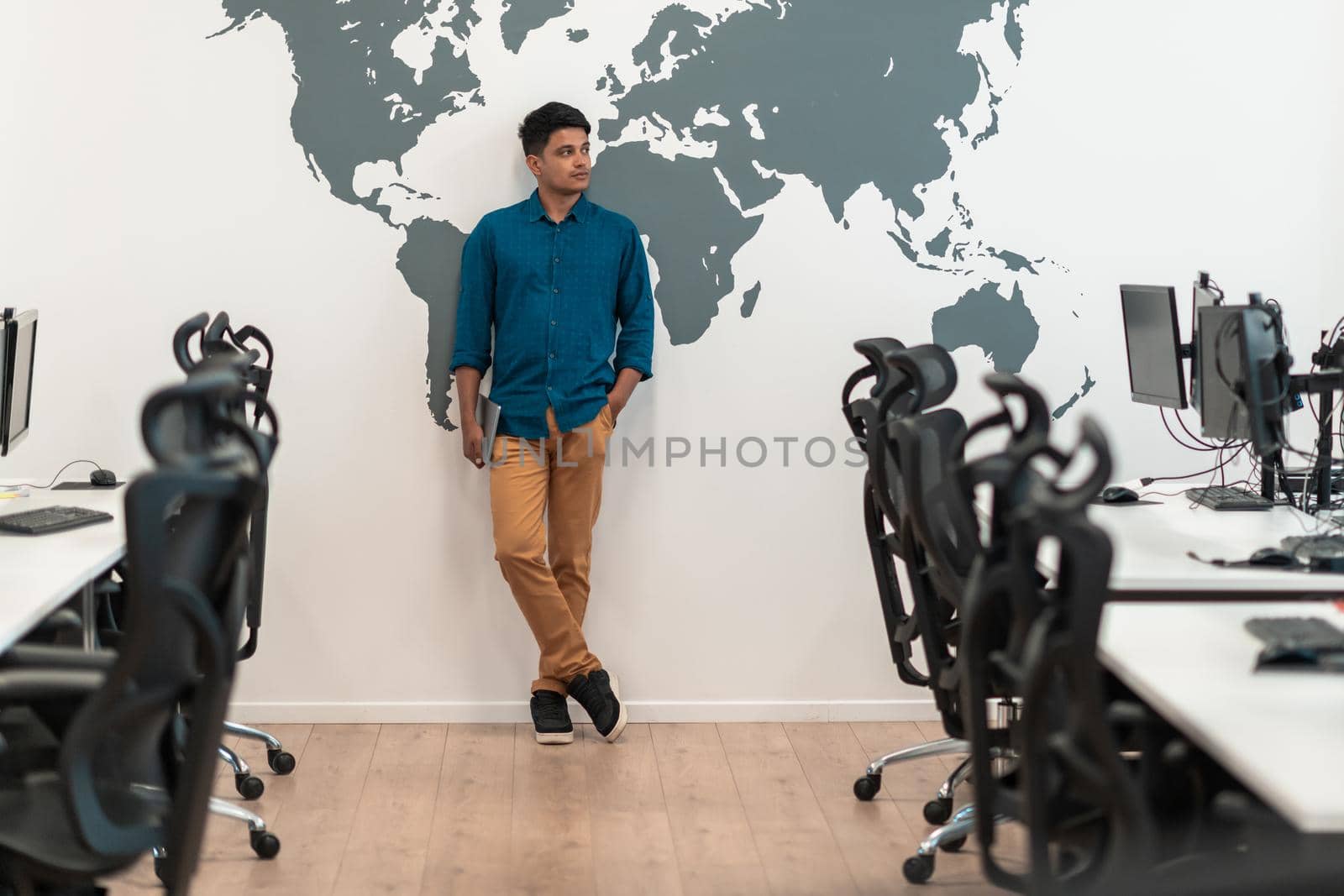 Portrait of casual business men leader standing confidence at Co-Working space.Small Business Startup Concept. Selective focus by dotshock