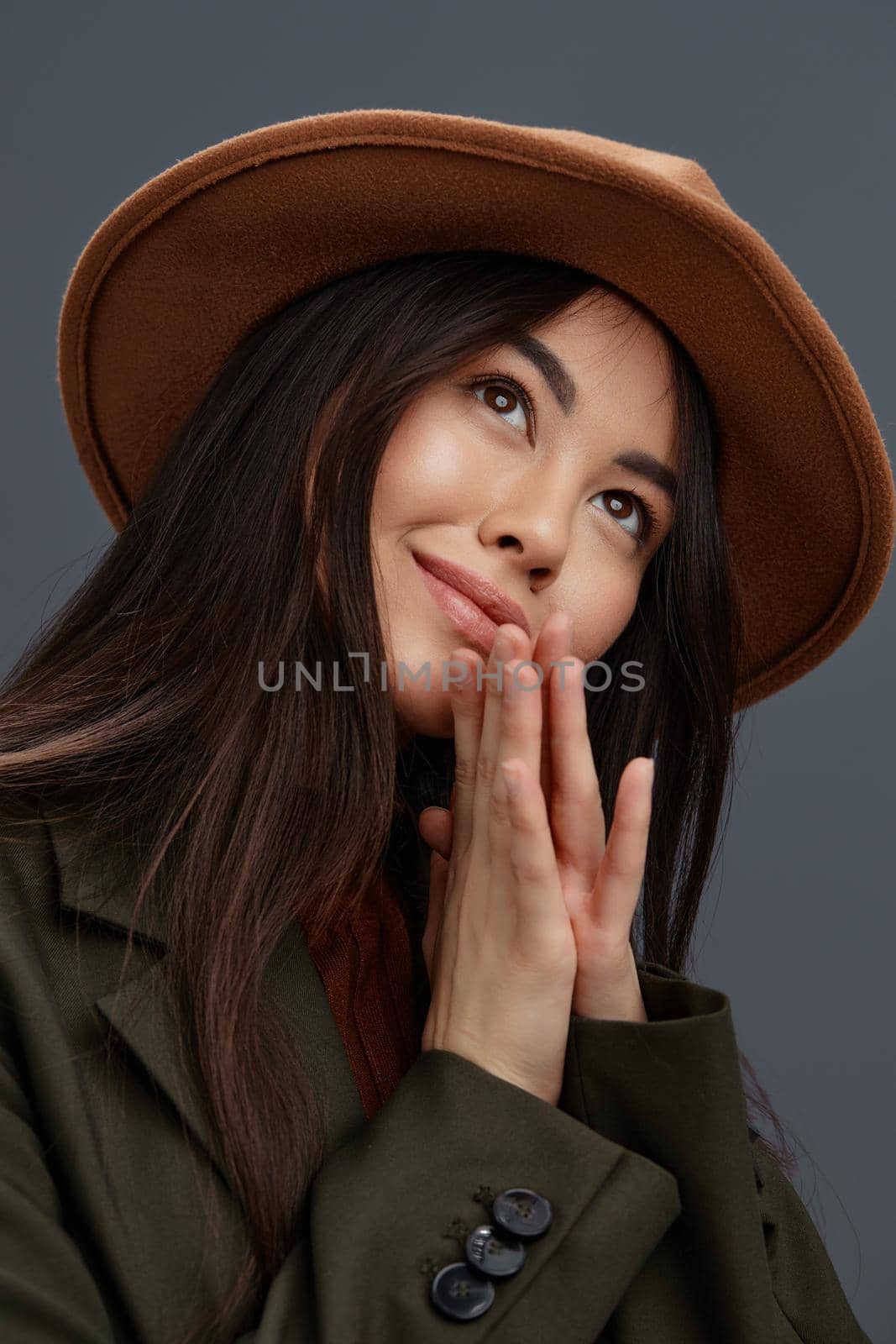young woman brown hat hand gestures fashion emotions isolated background. High quality photo