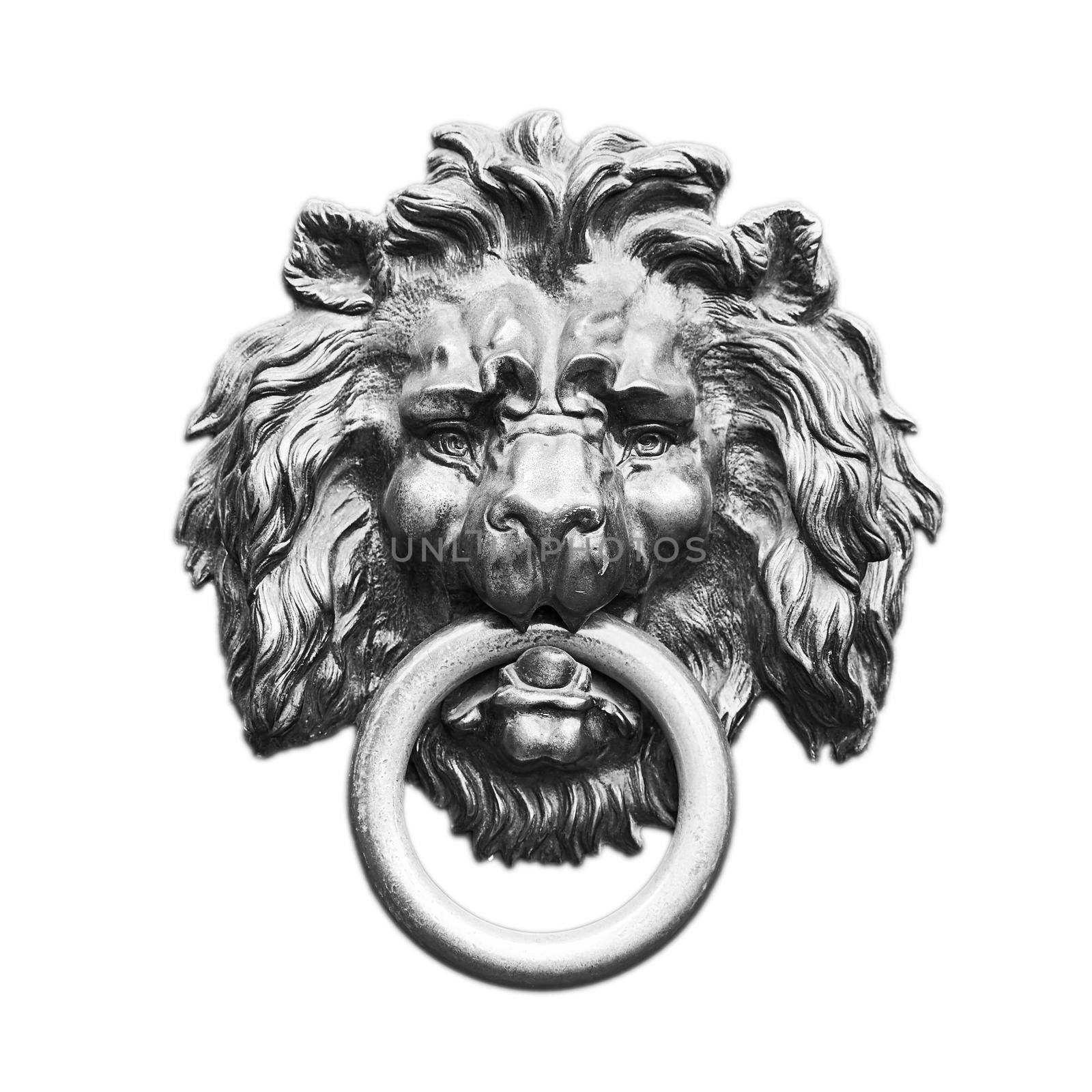 Vintage old bronze lion head in black and white isolated on white background