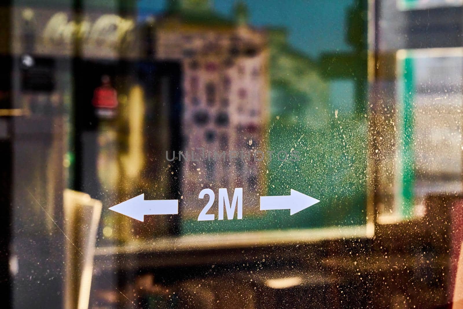 2 metre distance sign in a shop window by ChrisWestPhoto
