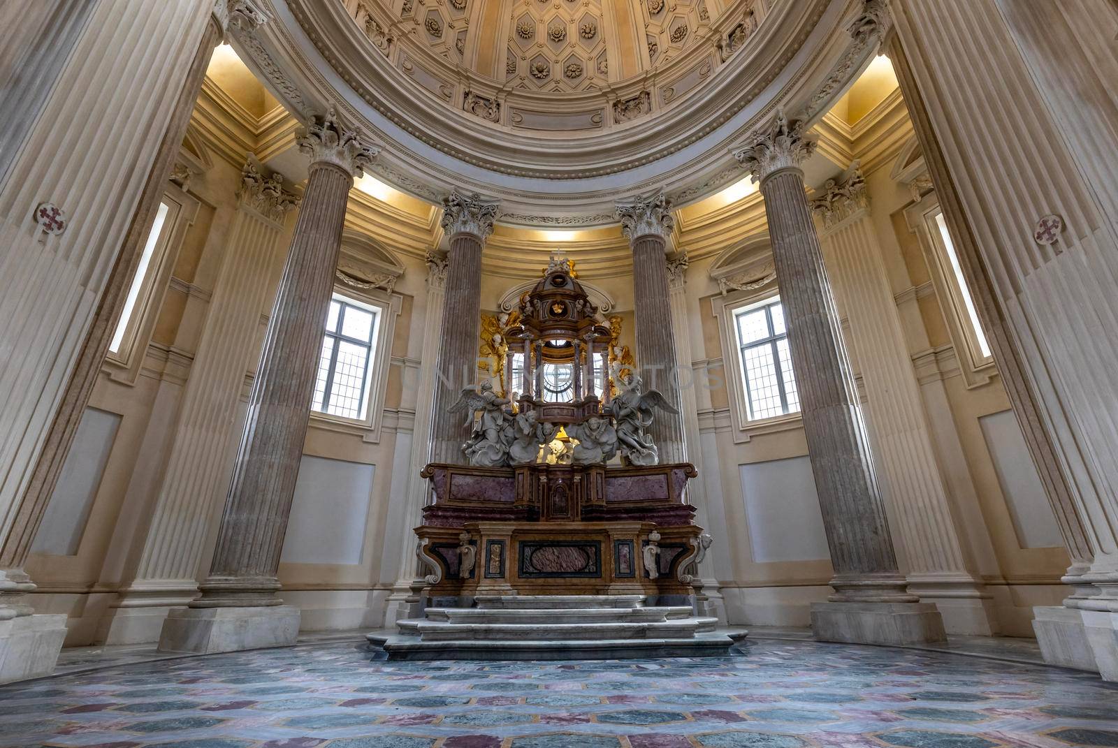 VENARIA REALE, ITALY - CIRCA MAY 2021: sacred catholic altar in Baroque style and cupola. Day light.