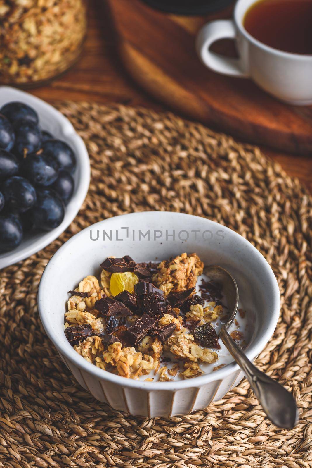 Bowl of Granola with Chocolate for Breakfast by Seva_blsv
