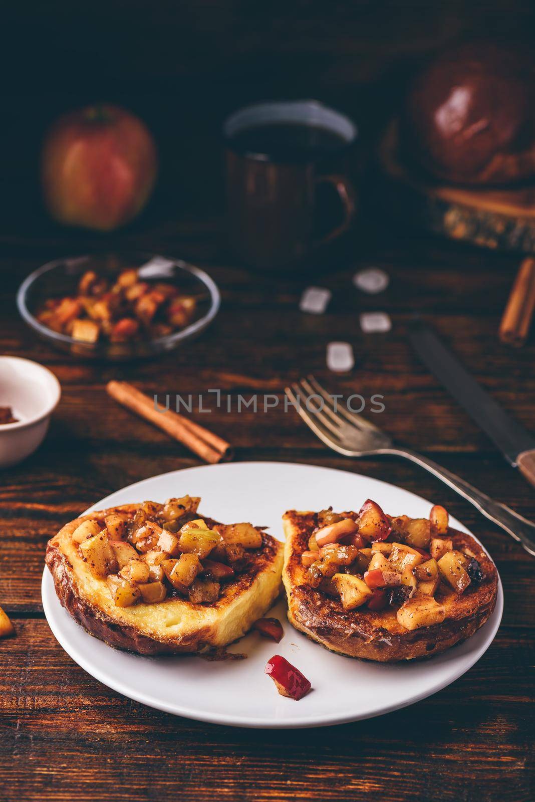 French toasts with chopped apple caramelized with cinnamon