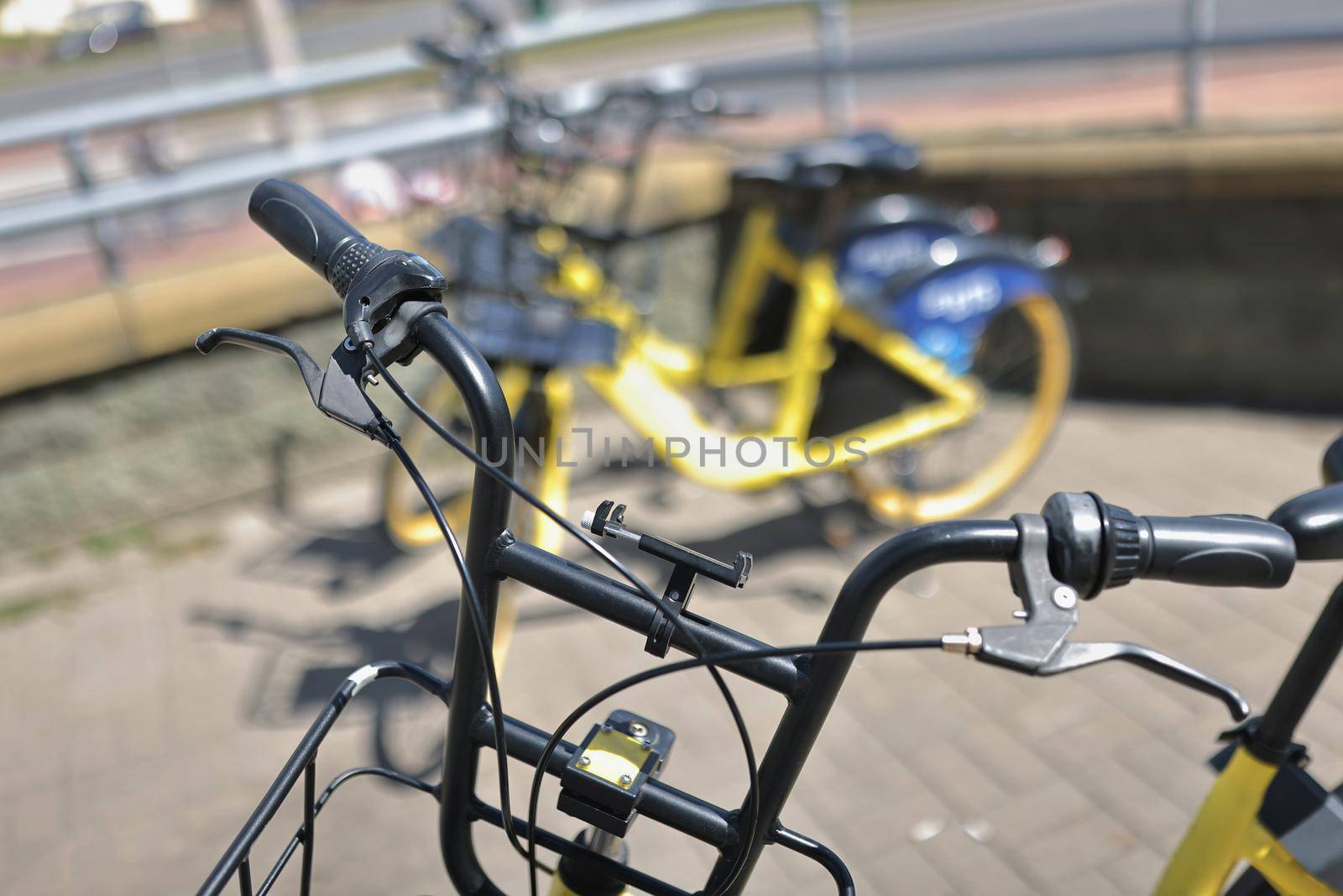 Rent bikes using code, city station with vehicle, take for street ride by kuprevich