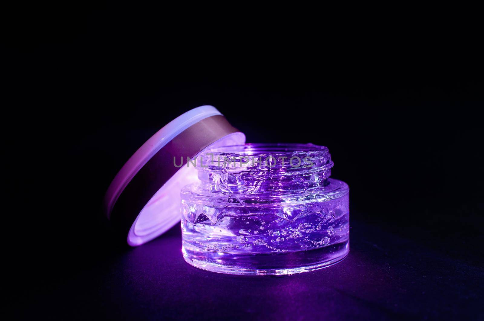 transparent jar with purple color moisturizing gel light  by ozornina