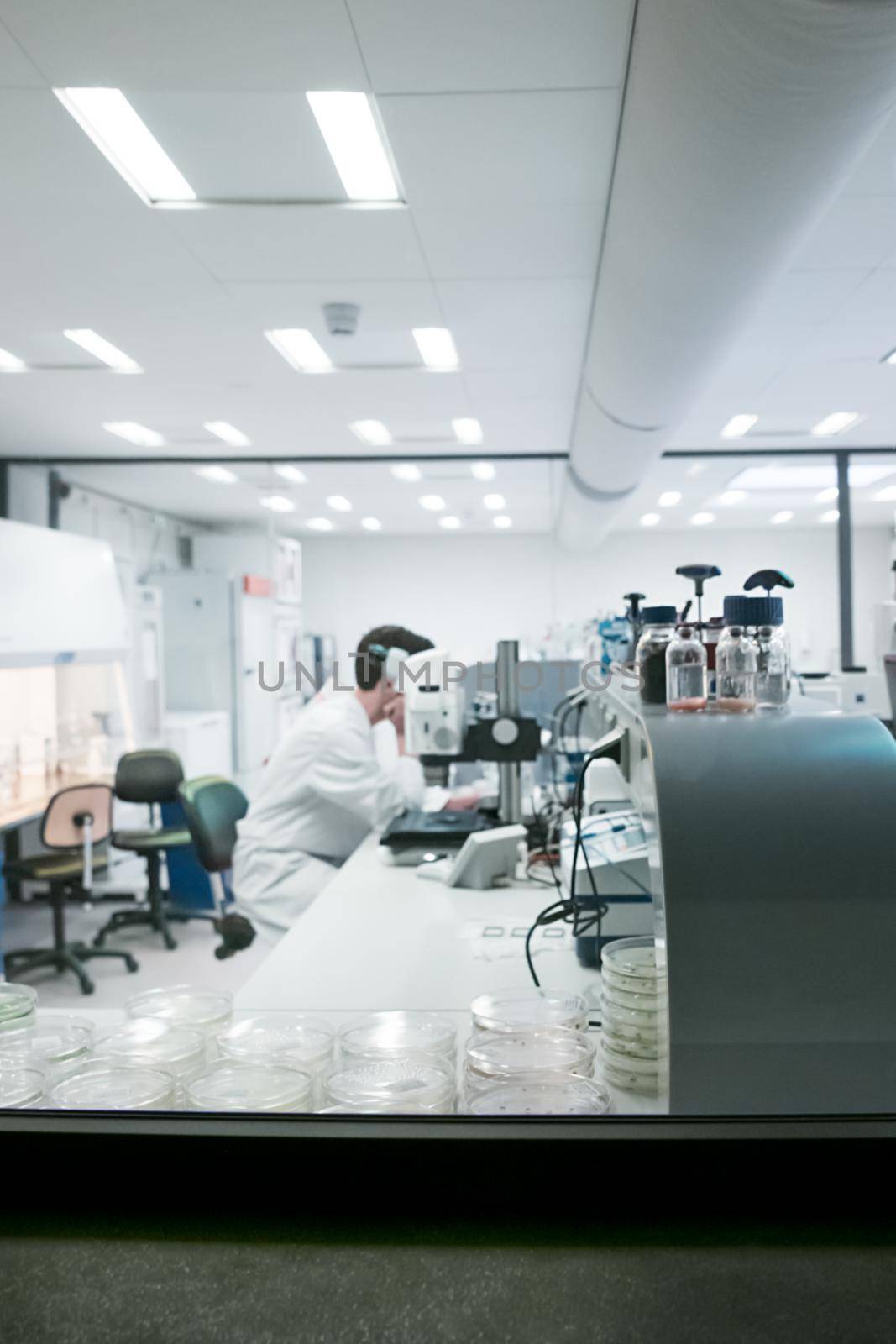 Scientists in the laboratory are developing vaccines against coronavirus COVID-19 Blurred photo