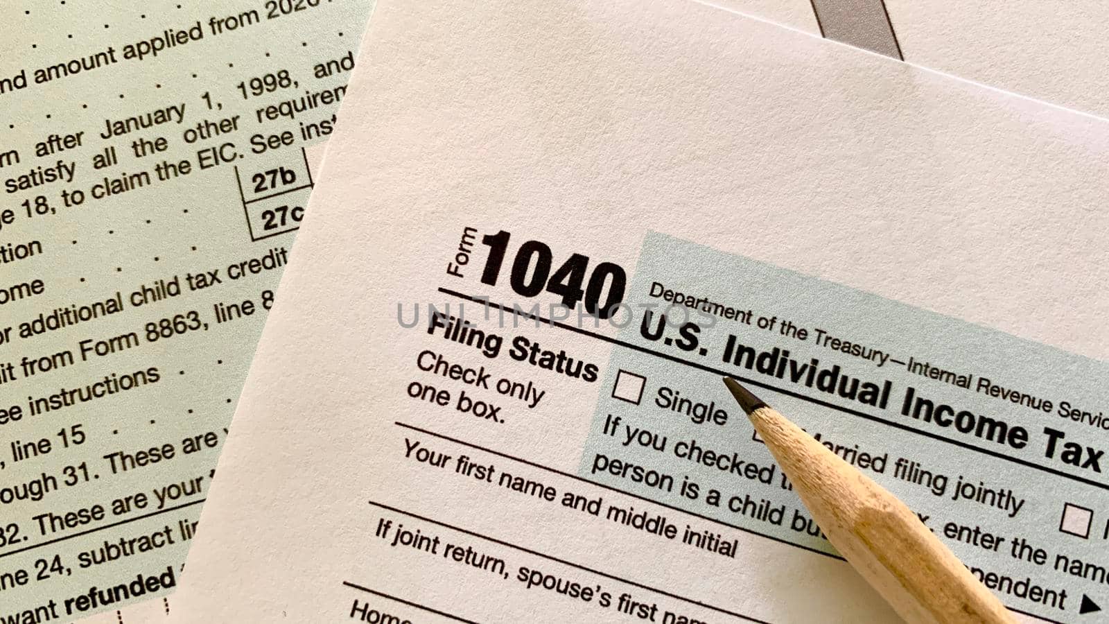 1040 US individual tax form with pencil.