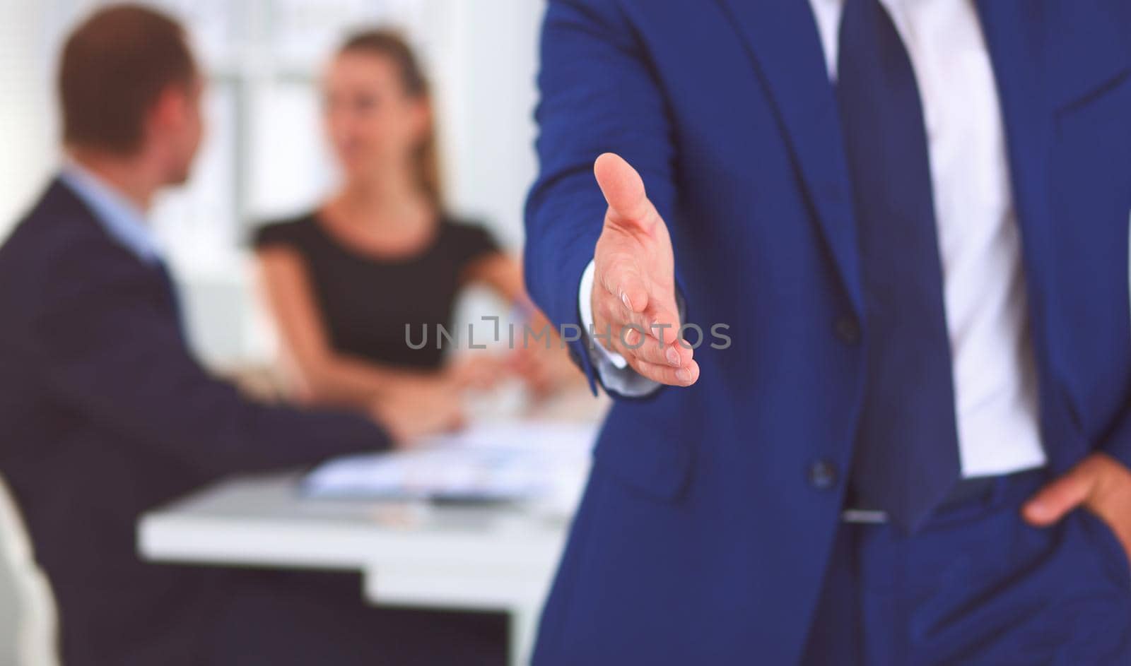 Closeup of a business handshake .