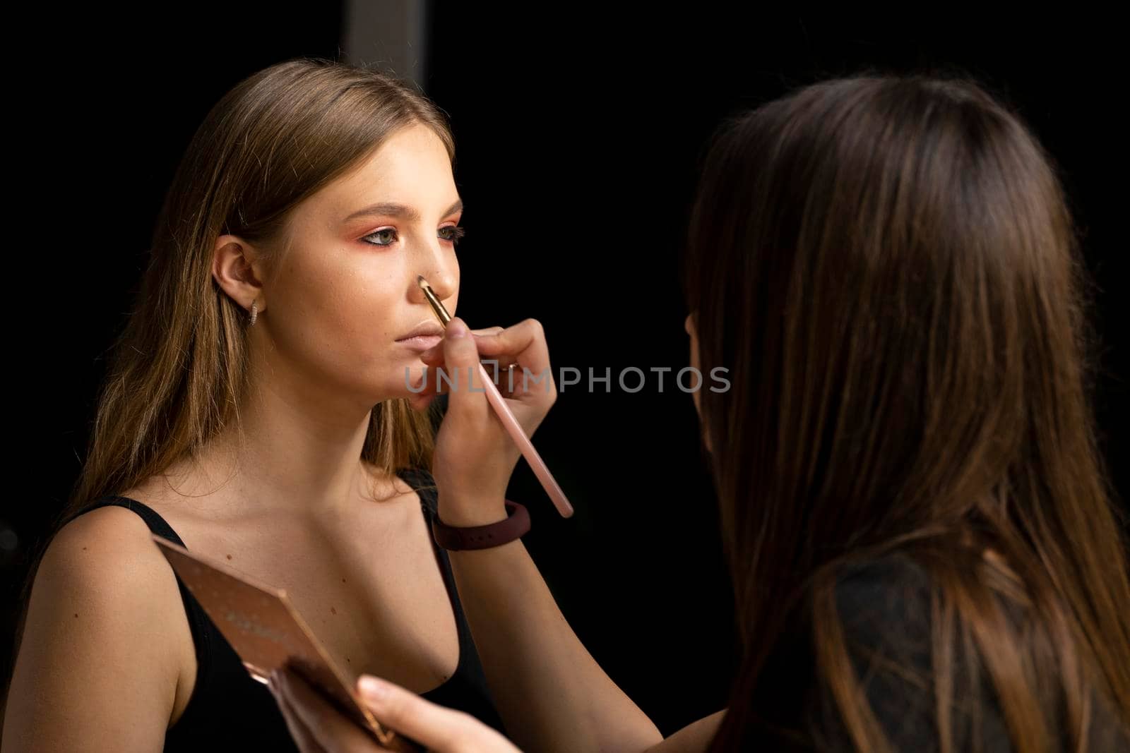Eyeshadow applying by proffesional make up artist. Makeup for eyes. by vovsht