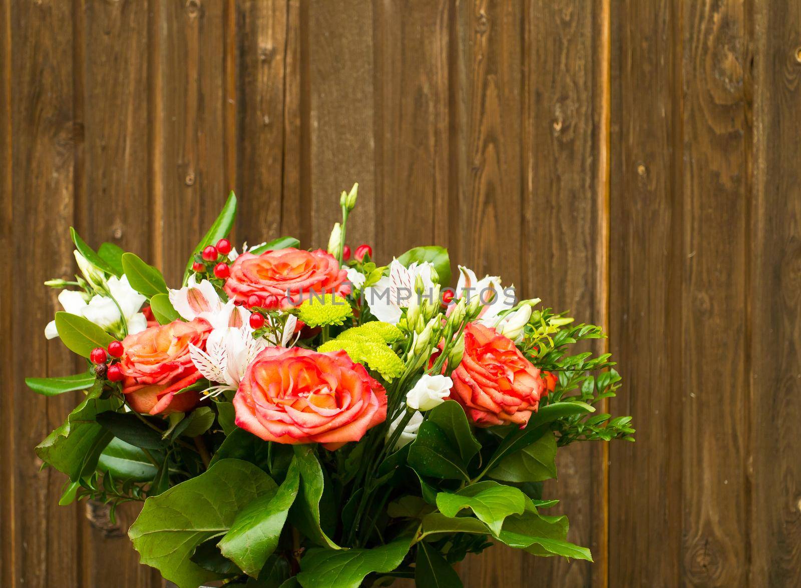 bouquet of flowers on a old wooden background with copy space by NataBene