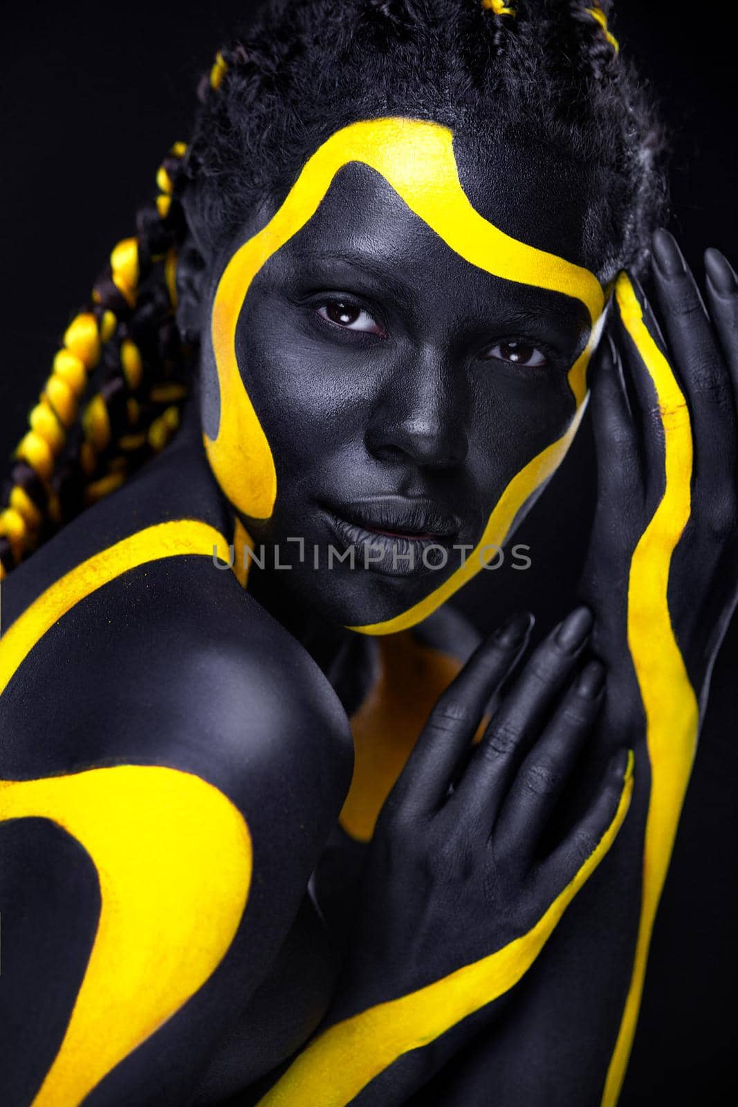 Yellow and black body paint. Woman with face art. Young girl with bodypaint. An amazing model with makeup. by MikeOrlov