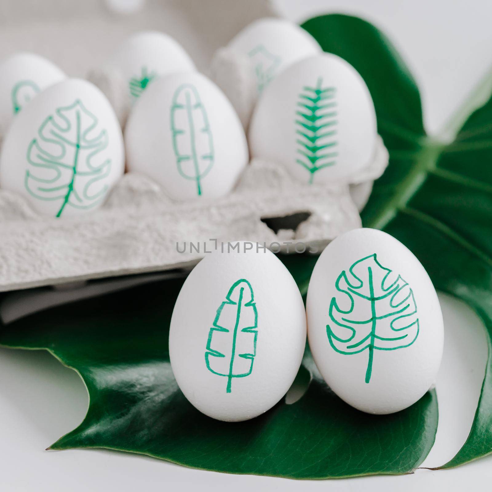 Tropical leaves drawings on easter eggs by fascinadora