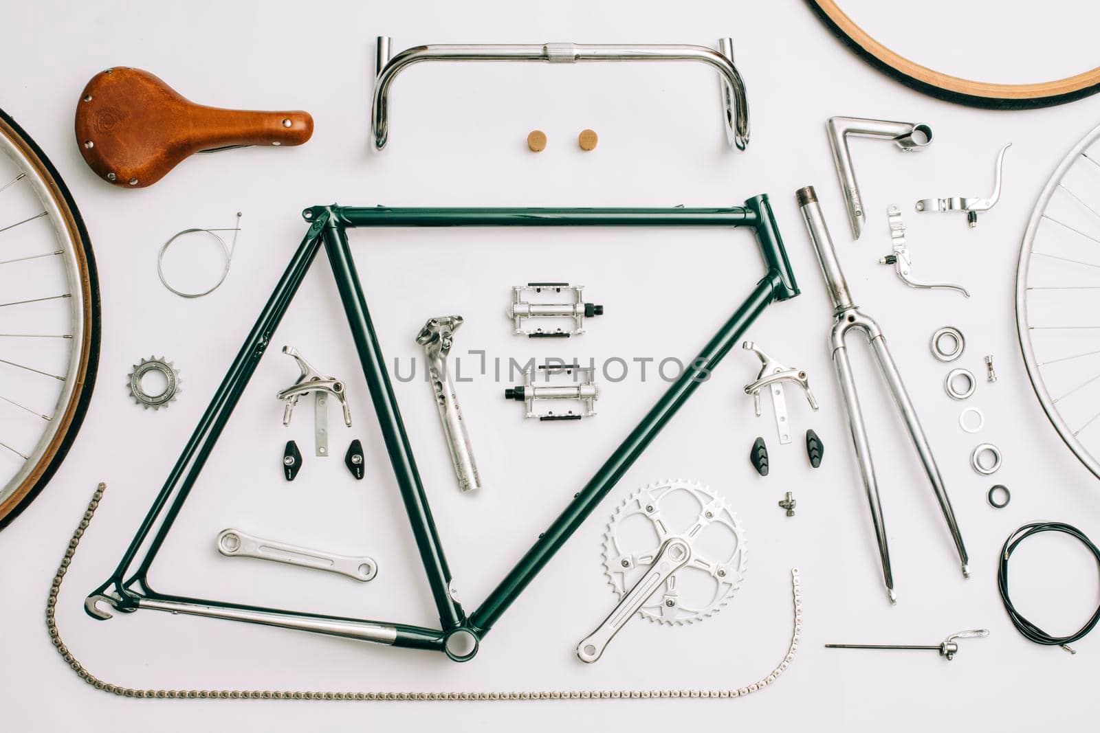 Vintage road bicycle, restoration. Zenith view. Leather tapes and saddle. White background. High quality photo