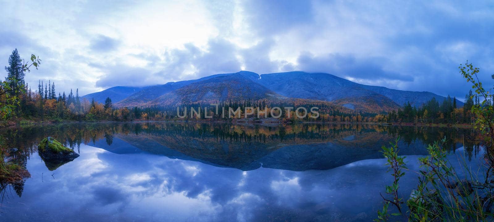 Reflection of mountains and clouds in the calm surface of the lake. Peaceful landscape. Khibiny by Andre1ns