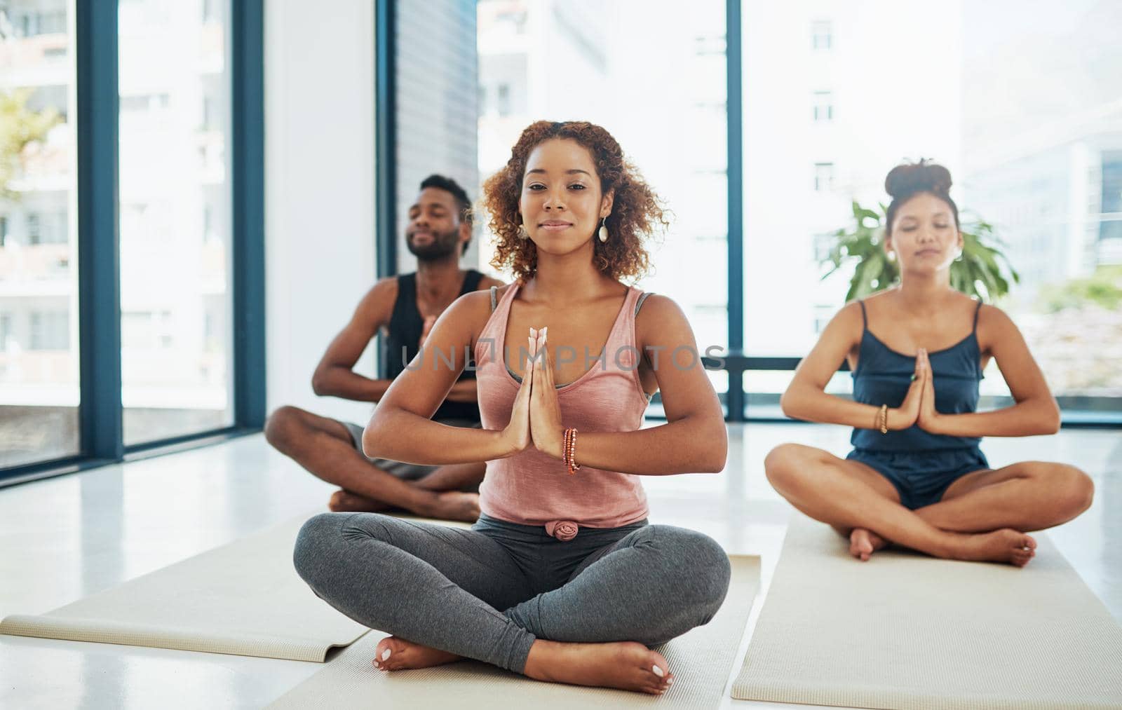 Shot of a group of people doing yoga