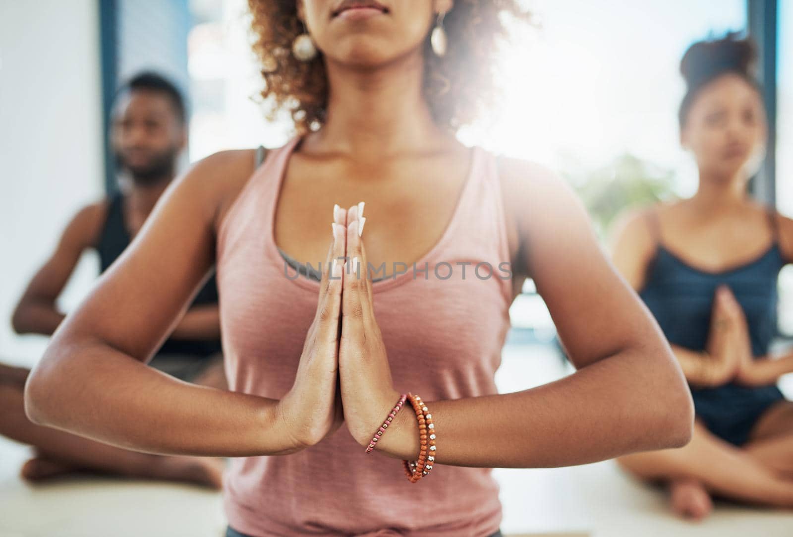 Shot of a group of people doing yoga