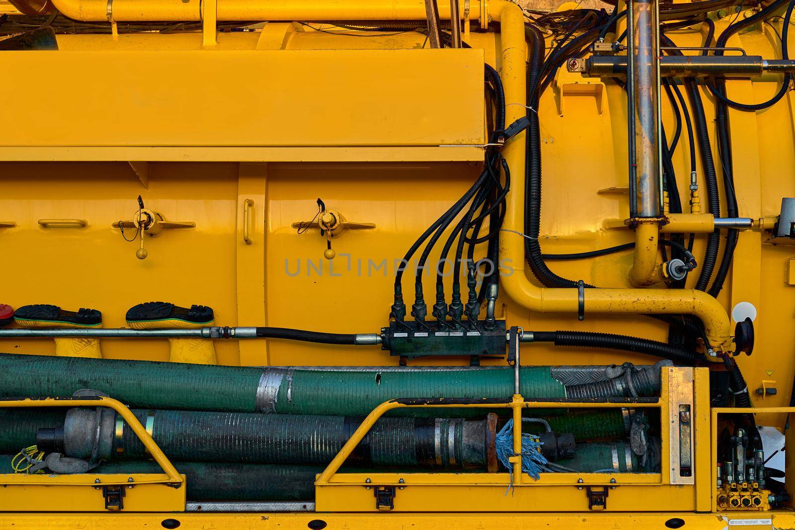 Abstract of yellow industrial machinery by ChrisWestPhoto