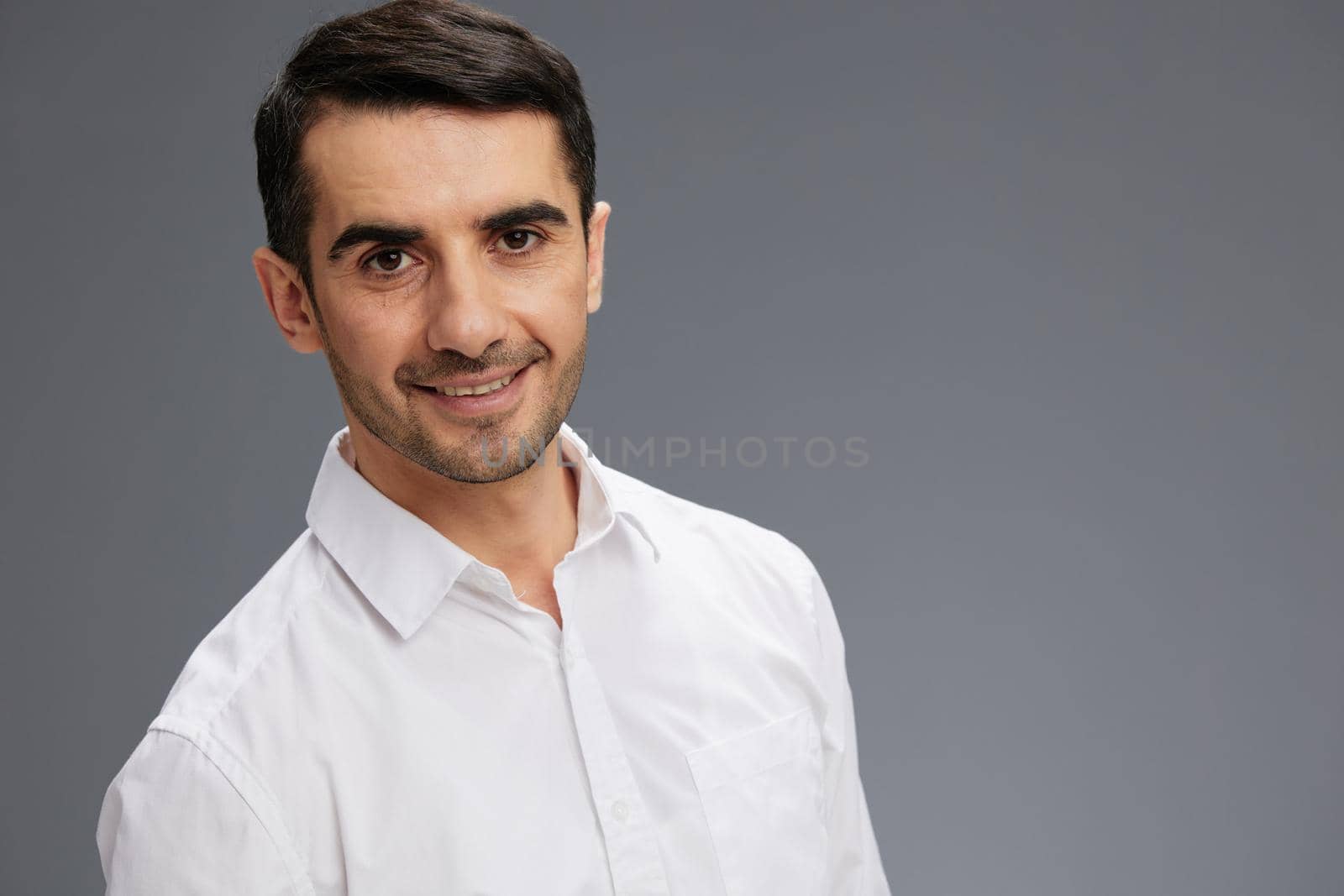 businessmen in a white shirt a pensive look isolated background. High quality photo