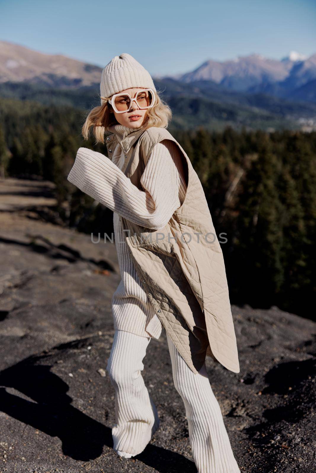 tourist fashion glasses mountain top nature freedom lifestyle. High quality photo