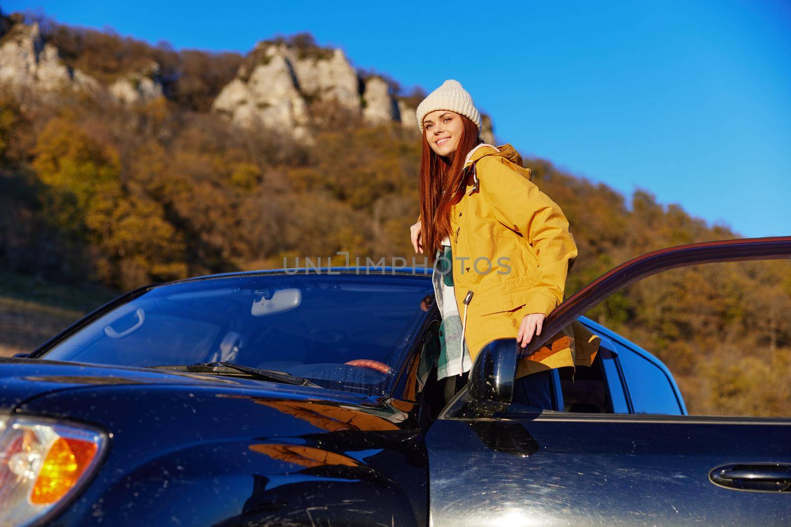 woman tourist black car nature travel adventure relaxation by SHOTPRIME