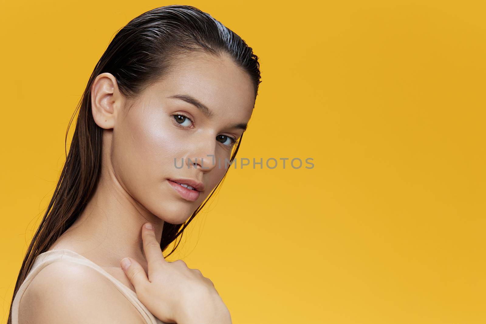 young woman clean face skin care isolated background by SHOTPRIME