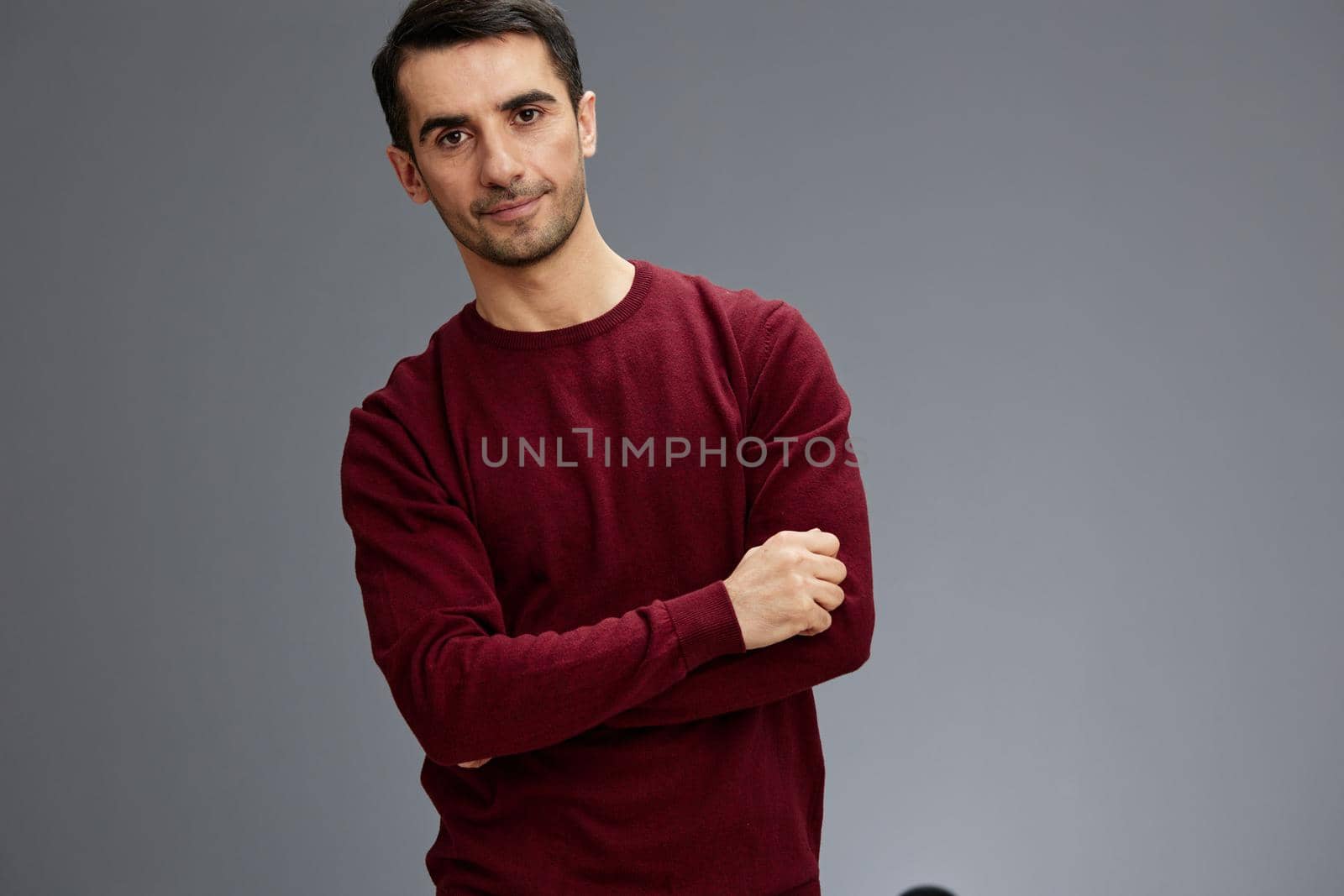 businessman in a sweater posing hand gesture emotions isolated background by SHOTPRIME