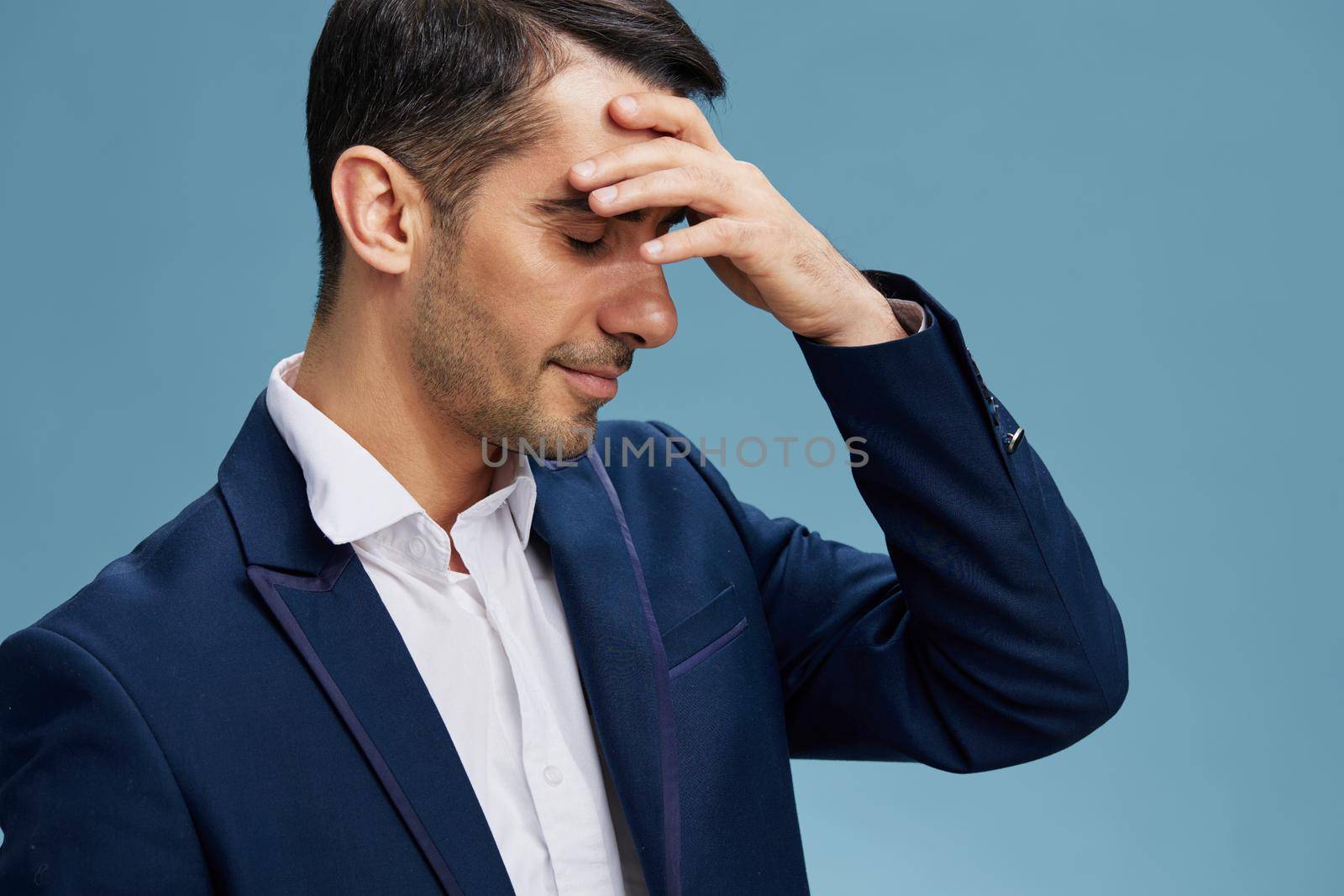 manager with a headache posing self-confidence business and office concept close-up. High quality photo