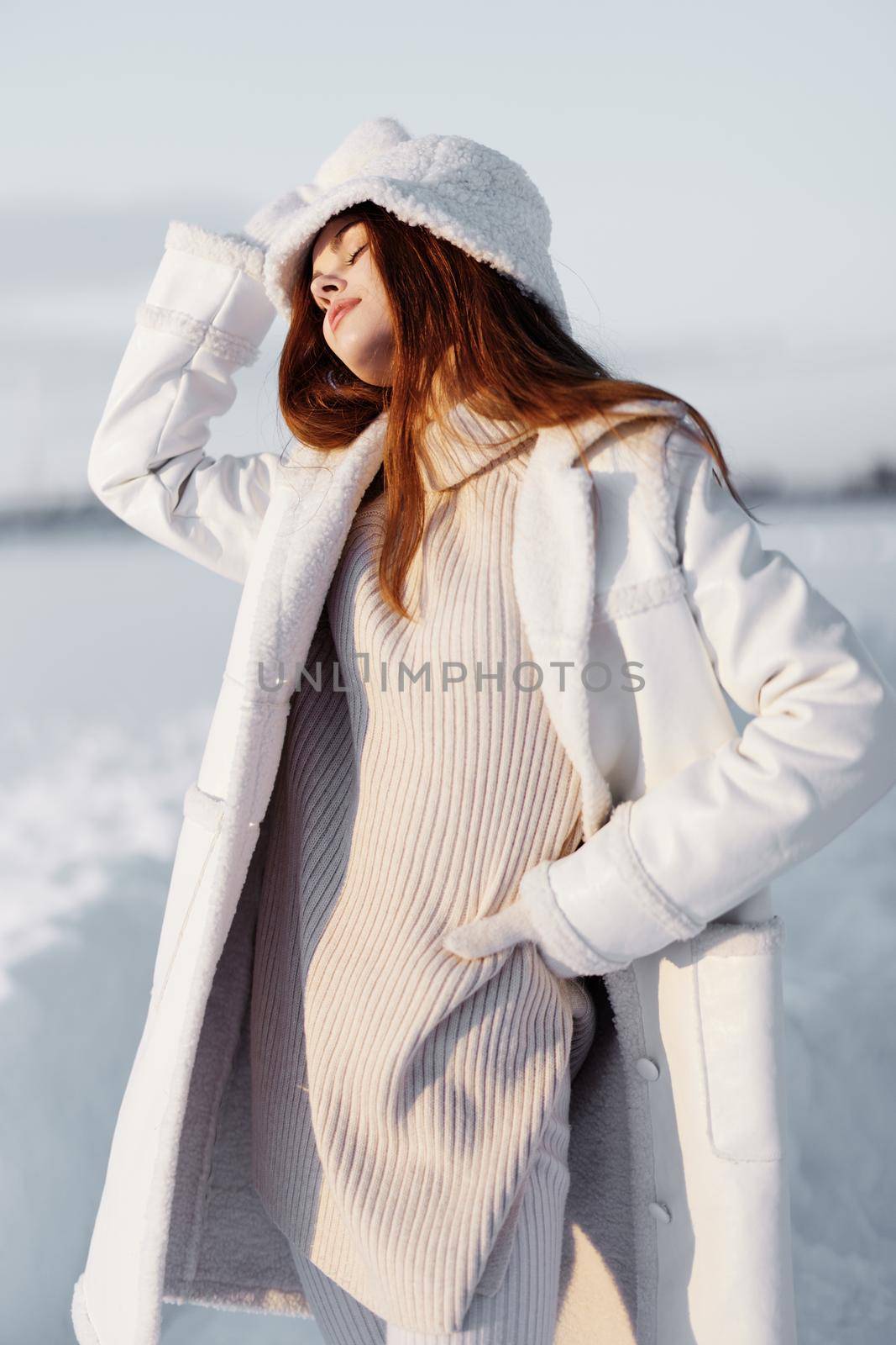 woman red hair snow field winter clothes travel by SHOTPRIME