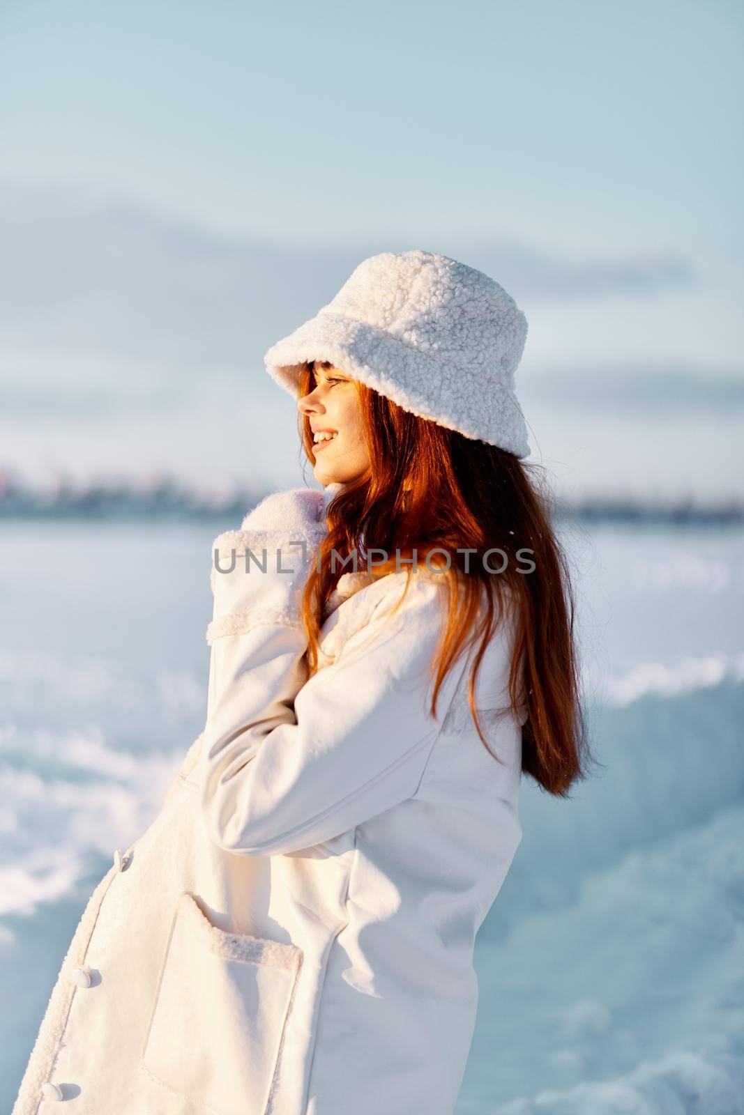 beautiful woman smile Winter mood walk white coat Lifestyle. High quality photo