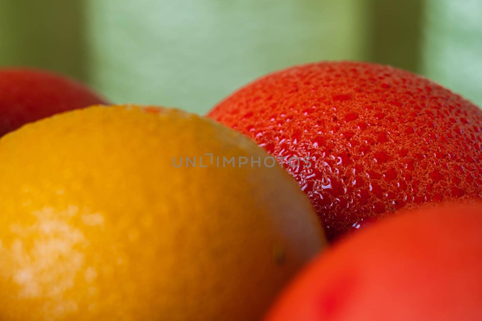 still life of a variety of colored Easter eggs in rustic style blur background. horizontal orientation