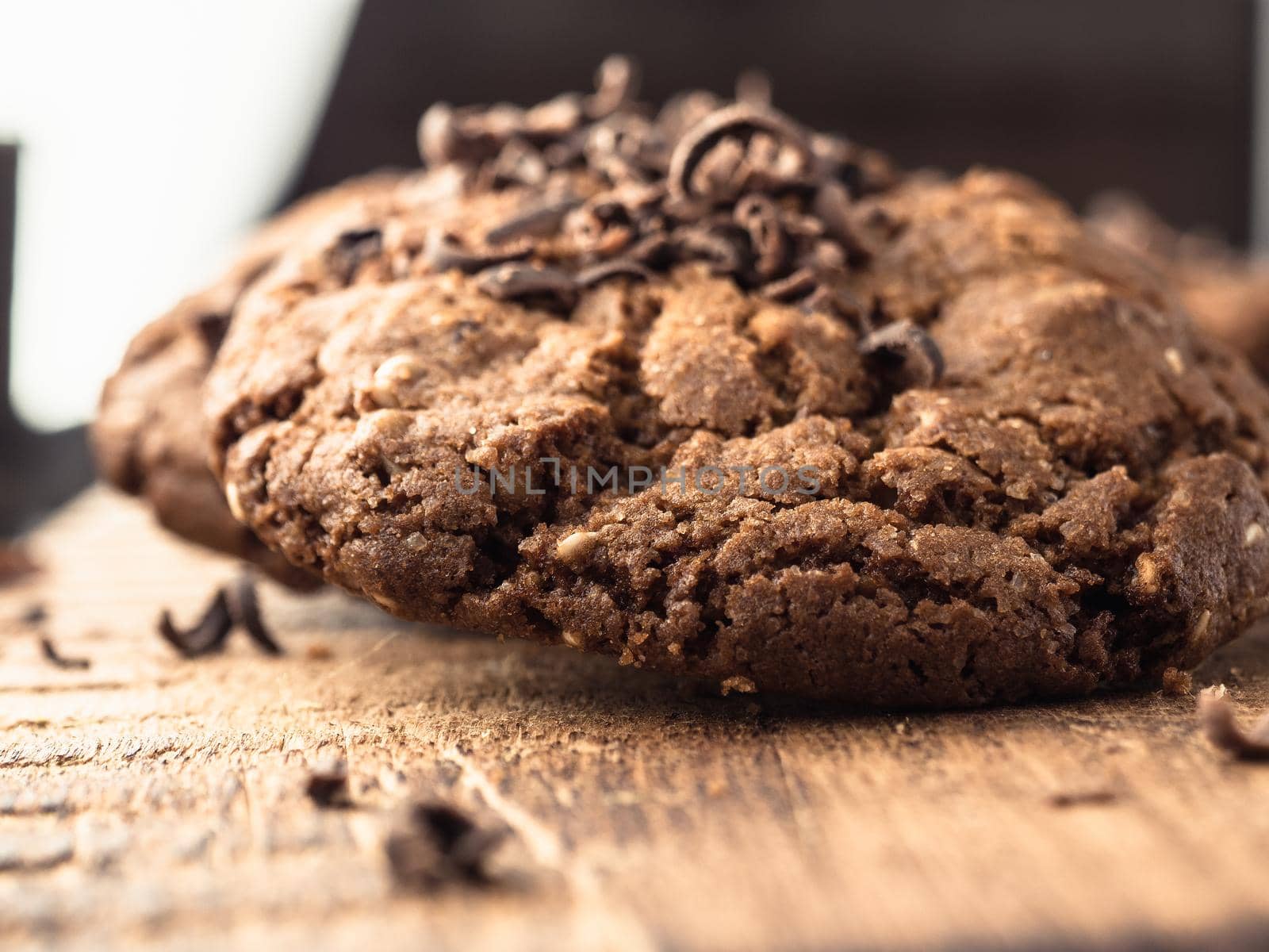 oatmeal cookies with chocolate sprinkle on a wooden board. close-up.