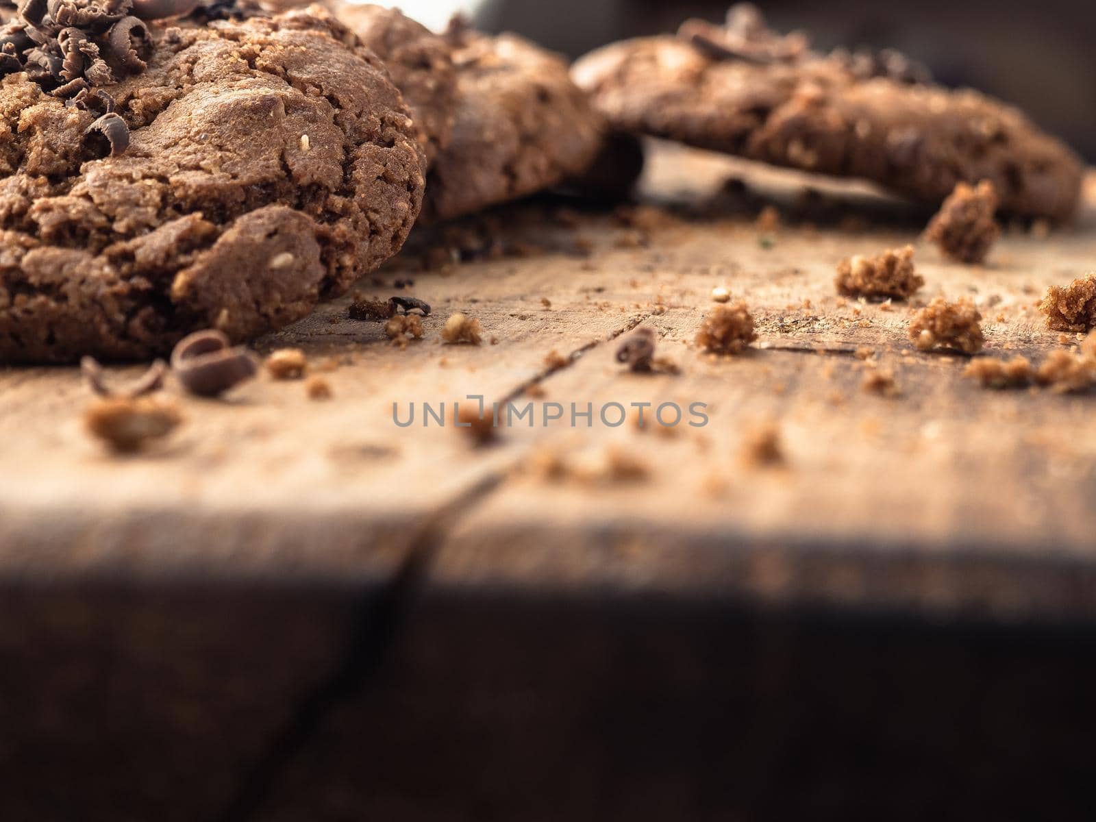 oatmeal cookies with chocolate sprinkle on a wooden board. close-up.