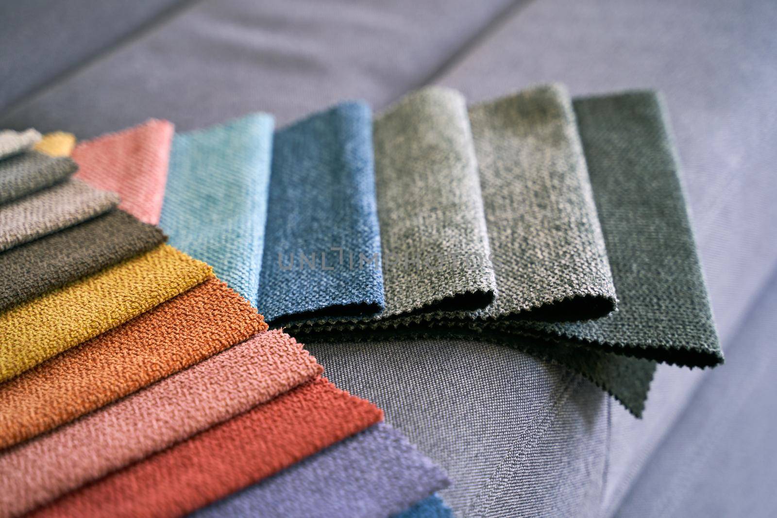 Colorful upholstery fabric samples in different colors