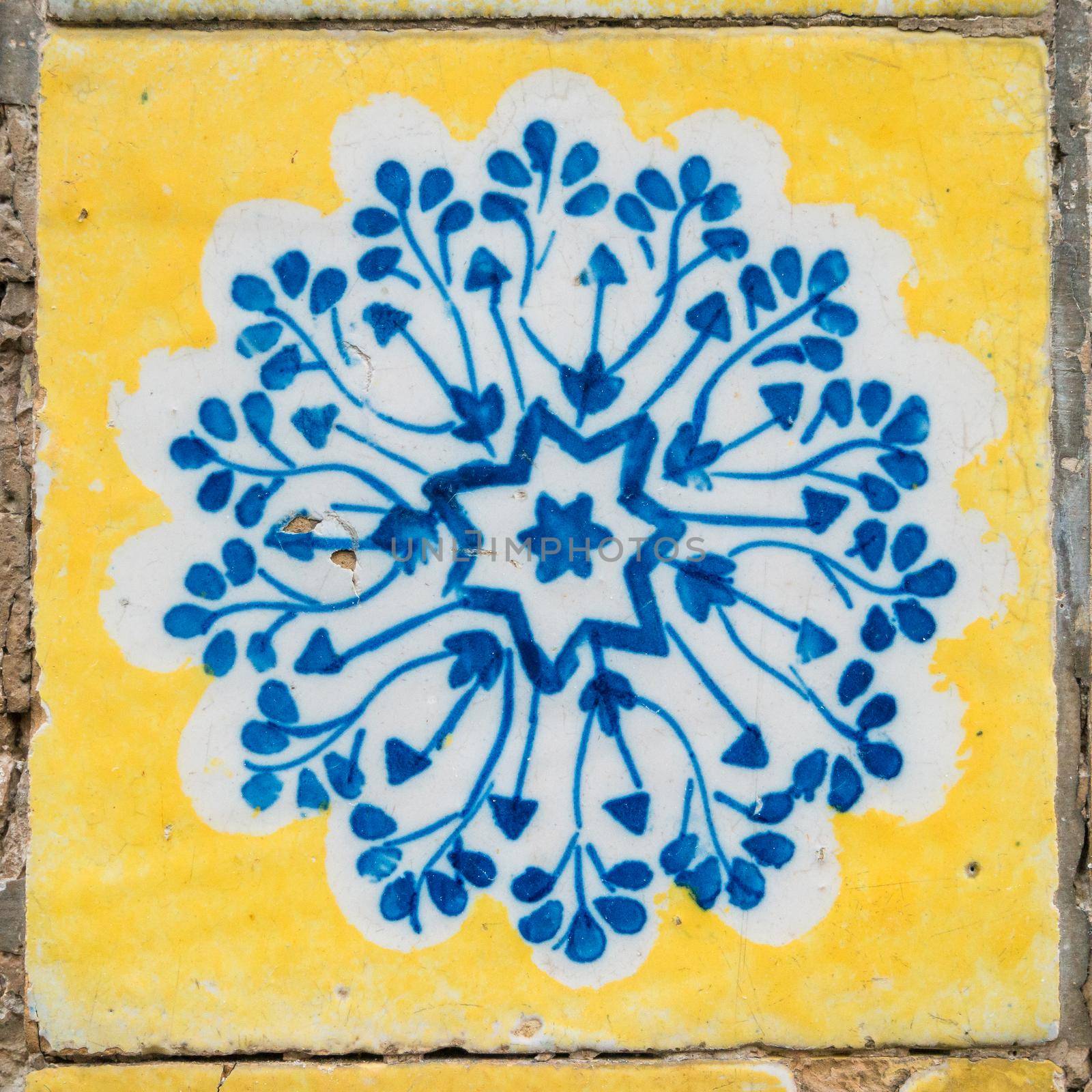 Old typical portuguese tiles called azulejos taken from the external walls of an old house in Lisbon
