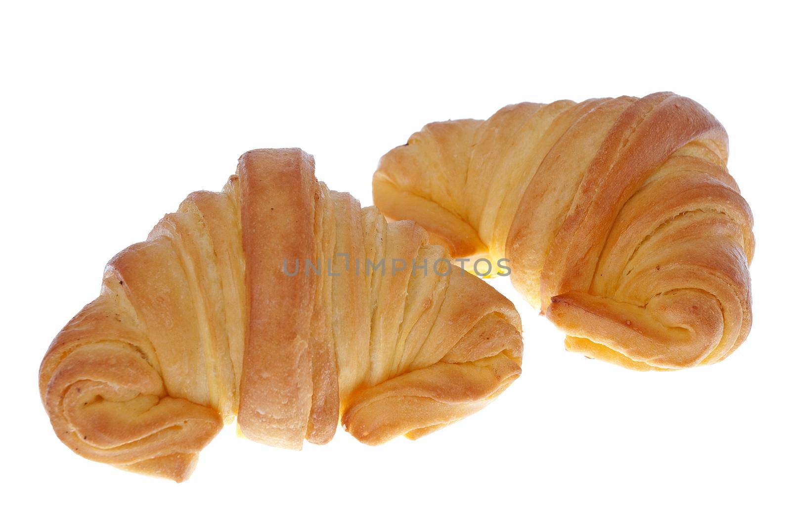Breakfast concept - croissant isolated on white background.