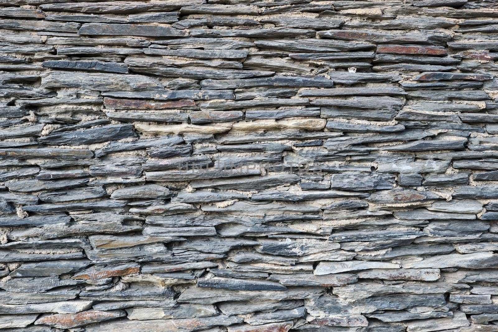 Wall made of old slate slabs by elxeneize