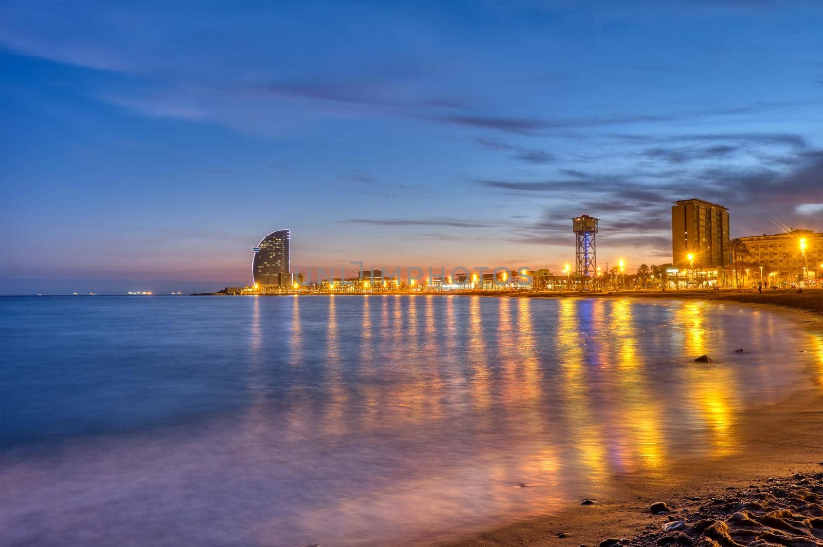 The beach of Barcelona in Spain at sunset