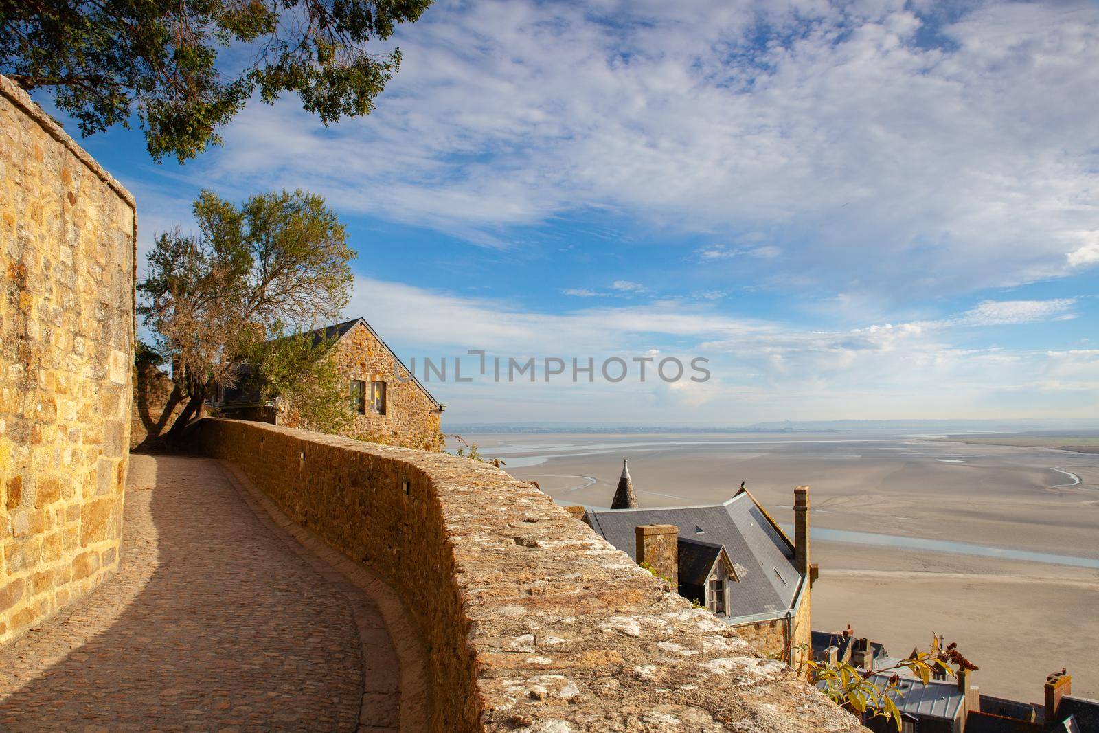 Promenade along the walls,Mont Saint Michel, Brittany, France. The Mont-Saint-Michel is one of Europe's most unforgettable sights.