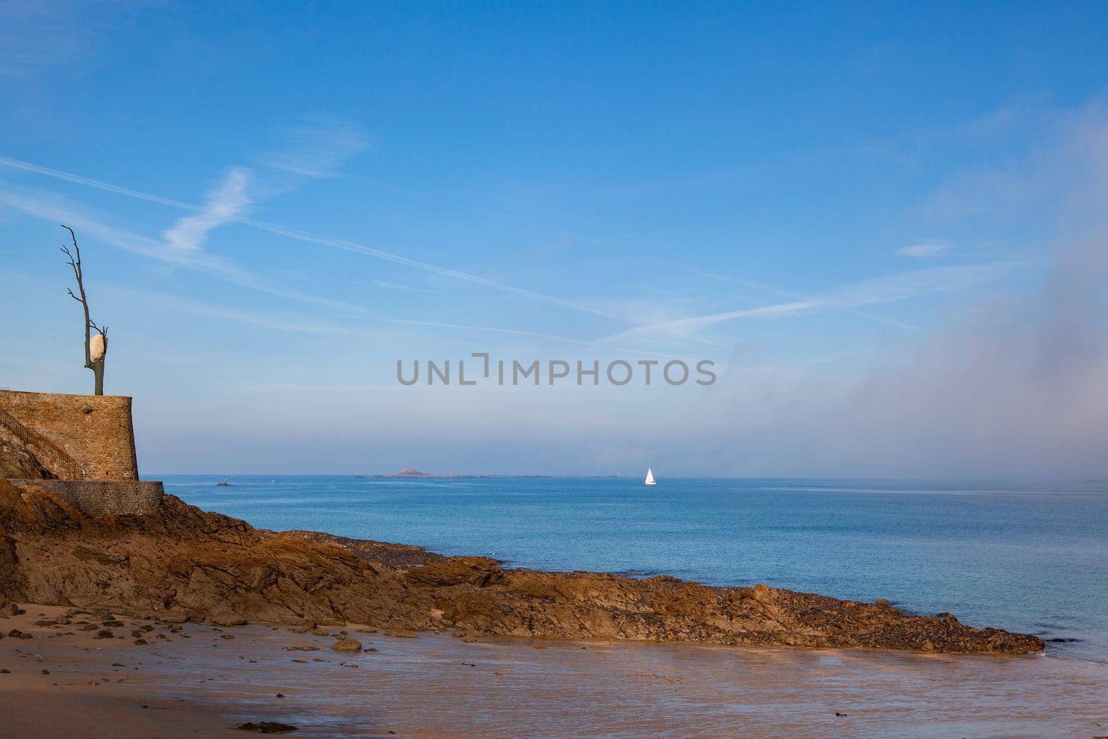 Lonely sailboat on the sea in the mist.Dinard, France by CaptureLight