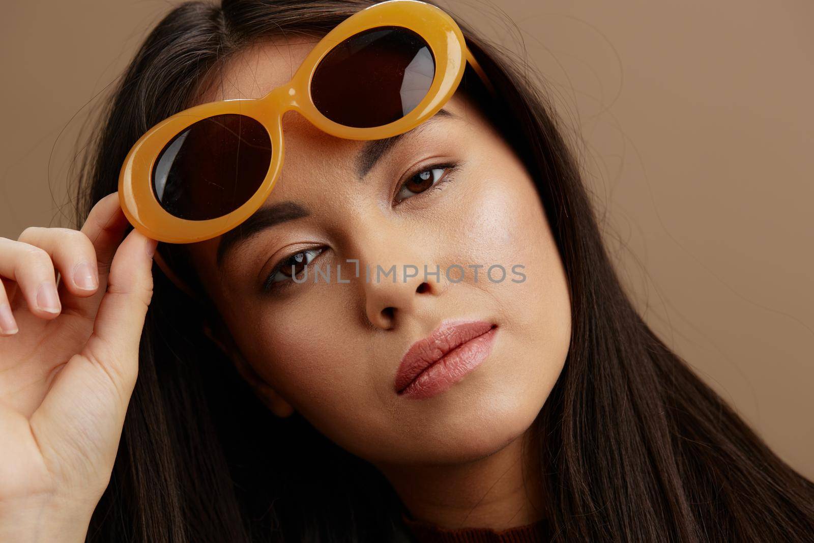 beautiful woman jacket sunglasses elegant style fashion isolated background by SHOTPRIME