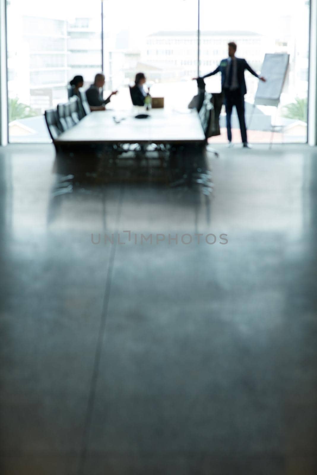 Shot of a group of executives having a meeting in a boardroom