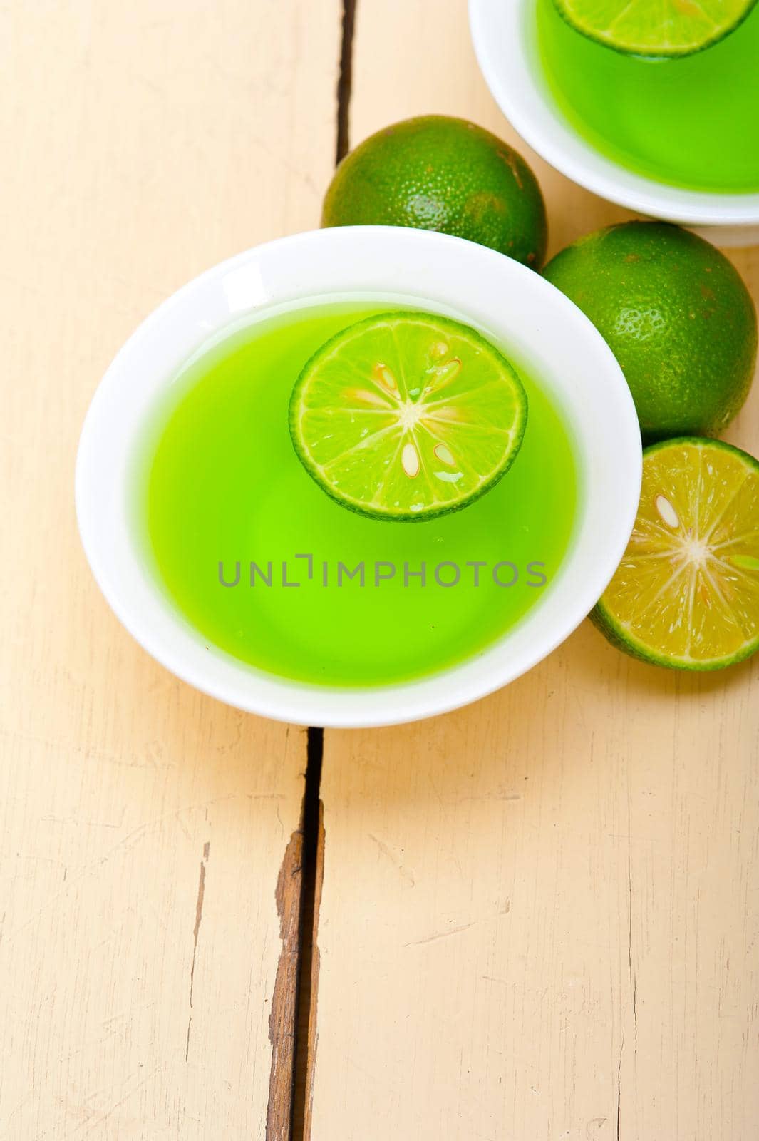 fresh and healthy green lime lemonade macro closeup 