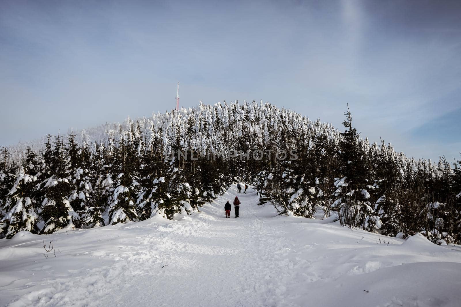 Way to the Top of the Mountain Peak with Transmitter and Blue Skies with Snow by Skrobanek