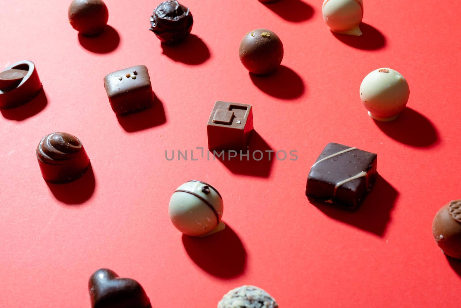 High angle view of dessert arranged on red background, copy space. valentine's day, food and love concept.