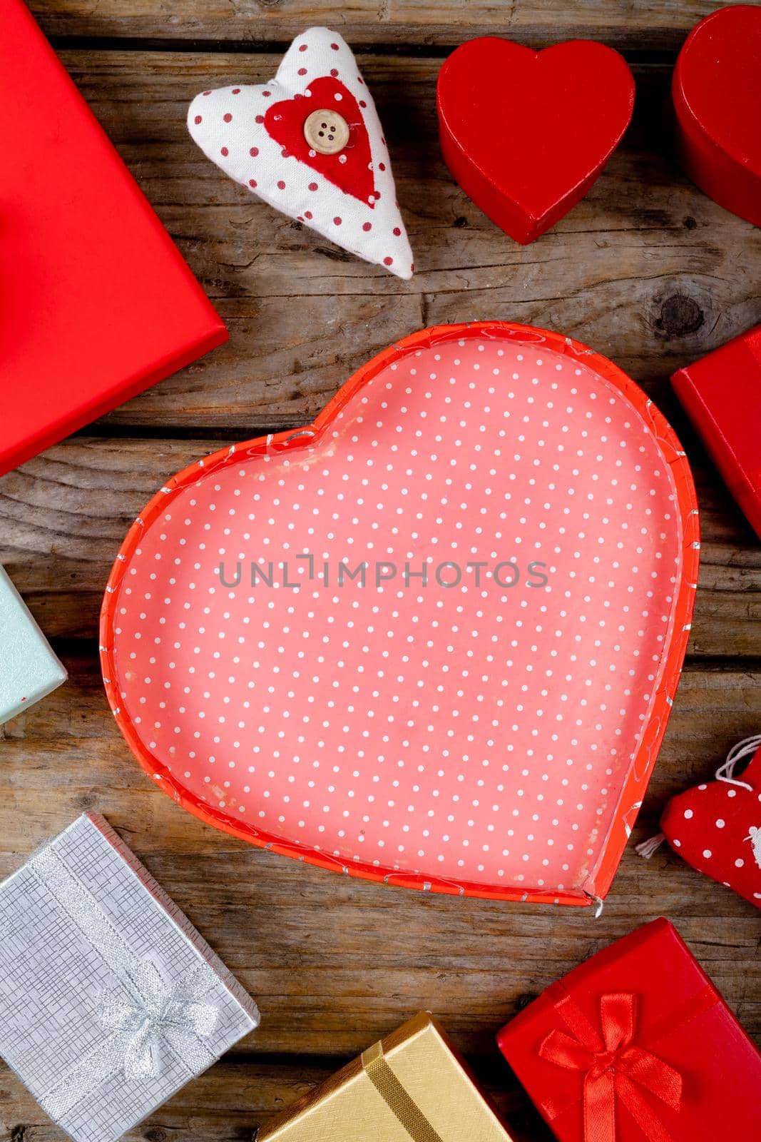 Close-up of various valentine gifts on wooden table, copy space by Wavebreakmedia