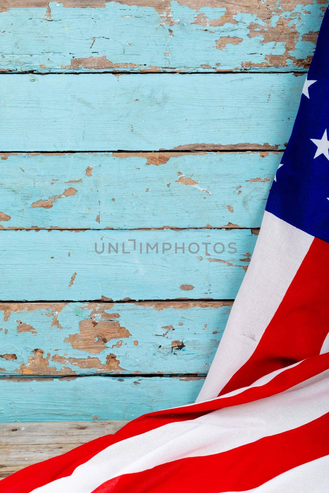 Usa flag on old blue wooden wall with copy space. independence day, national flag and patriotism.